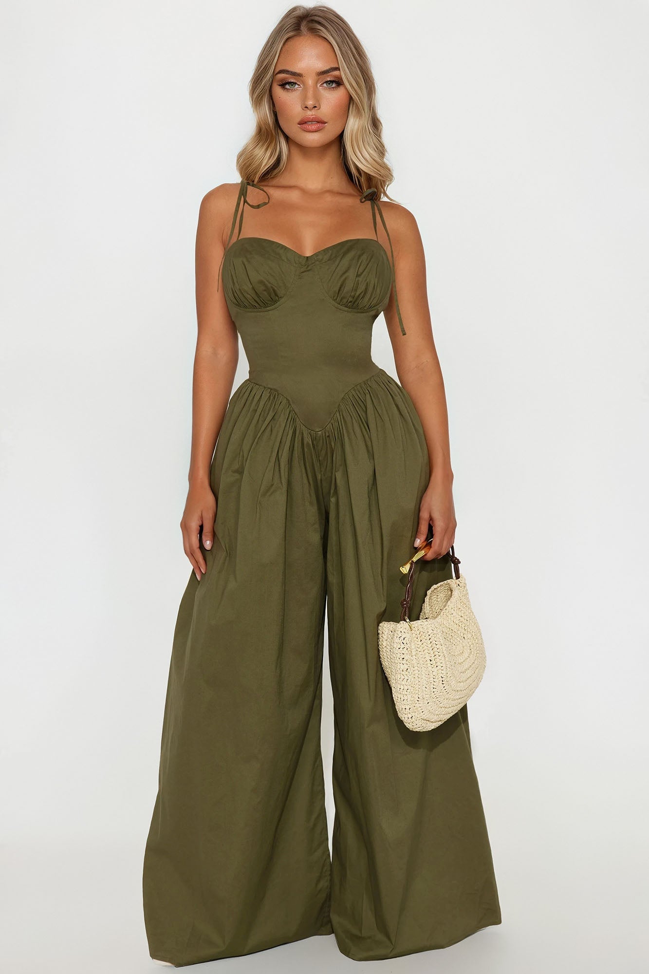 https://cdn.shopify.com/s/files/1/0293/9277/files/05-01-25_S3_28_KNHJ4110702_Olive_JP_AS_11-42-33_16470_CM-Vita_SG.jpg?v=1747407248