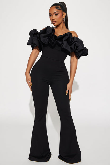 https://cdn.shopify.com/s/files/1/0293/9277/files/01-24-24_S5_40_JUMPSUIT08023_Black_P_KJ_AC_12-19-46_37055_PXF.jpg?v=1706471769