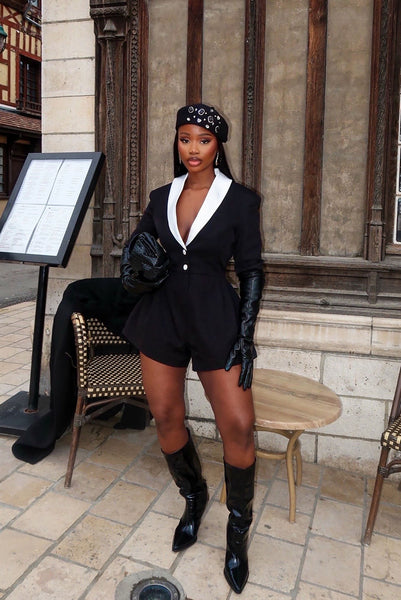 https://cdn.shopify.com/s/files/1/0293/9277/files/02-02-26_Flirty_Babe_Long_Sleeve_Romper_Black-White_036_JR.jpg?v=1774545973&with=400&height=600