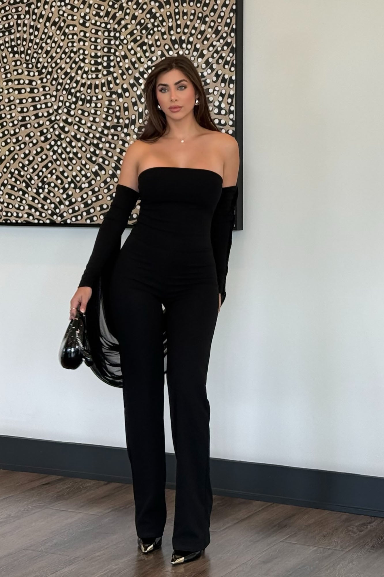 https://cdn.shopify.com/s/files/1/0293/9277/files/02-09-26_In_The_Night_Strapless_Draped_Wrap_Jumpsuit_Black_085_JR.jpg?v=1774631942