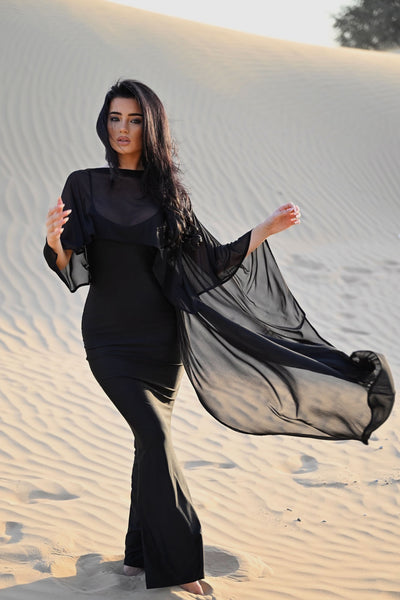 https://cdn.shopify.com/s/files/1/0293/9277/files/03-02-26_Staying_True_Satin_Maxi_Dress_Black_026_JR.jpg?v=1775749097&with=400&height=600