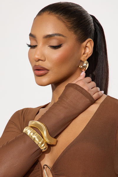 https://cdn.shopify.com/s/files/1/0293/9277/files/03-04-25_S8_52_ZDFNA0279_Gold_RK_PC_13-53-10_55386_PXF.jpg?v=1741293985&with=400&height=600