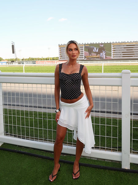https://cdn.shopify.com/s/files/1/0293/9277/files/03-30-26_Analisa_Asymmetric_Ruched_Midi_Skirt_White_025_CM.jpg?v=1780954236&with=400&height=600