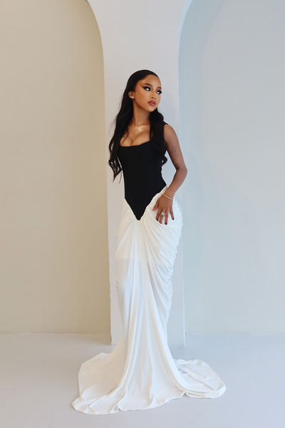 https://cdn.shopify.com/s/files/1/0293/9277/files/03-30-26_Sterling_Draped_Gown_Black-White_097_CM.jpg?v=1780955977&with=400&height=600