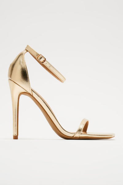 https://cdn.shopify.com/s/files/1/0293/9277/files/04-02-24_S10_30_NEO01_Gold_CXB_13-30-23_10316_SG_ES.jpg?v=1720741308&with=400&height=600