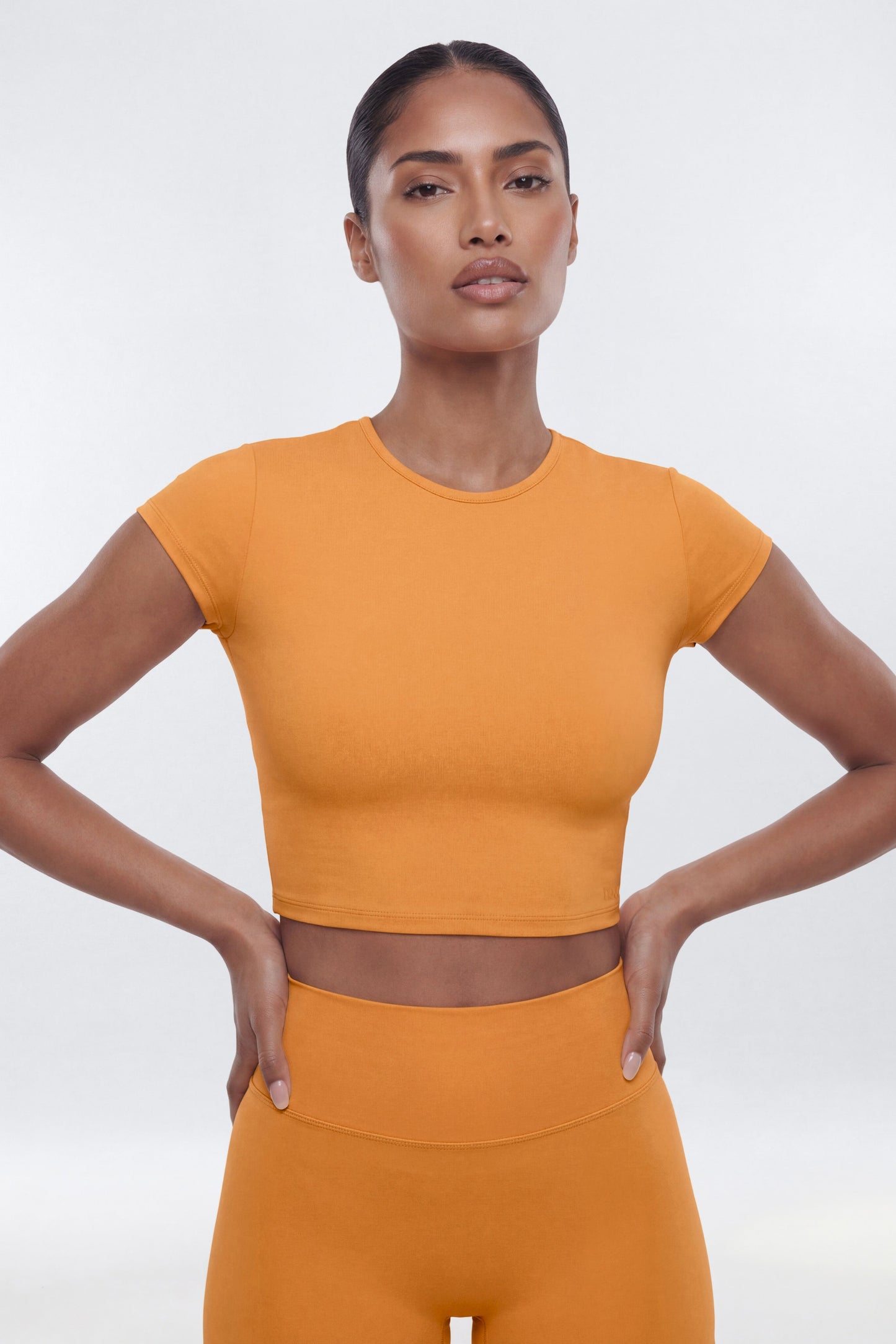 https://cdn.shopify.com/s/files/1/0293/9277/files/04-23-26_S9_6_B425SP1201_Tangerine_JG_IM_08-51-59_0156-7_EH_ES_JA.jpg?v=1778517659