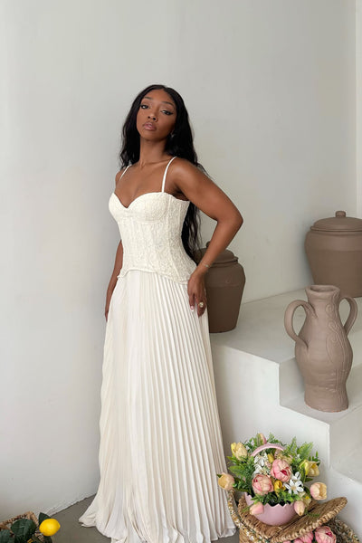 https://cdn.shopify.com/s/files/1/0293/9277/files/05-04-26_Daniella_Lace_Corset_Pleated_Maxi_Dress_Cream_016_CM.jpg?v=1781020531&with=400&height=600