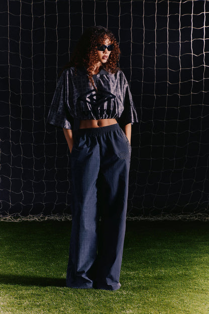 https://cdn.shopify.com/s/files/1/0293/9277/files/05-11-26_UMBRO_-Collection_LOOK_62_RA_CW_10-12-17_11813_ES.jpg?v=1780421321