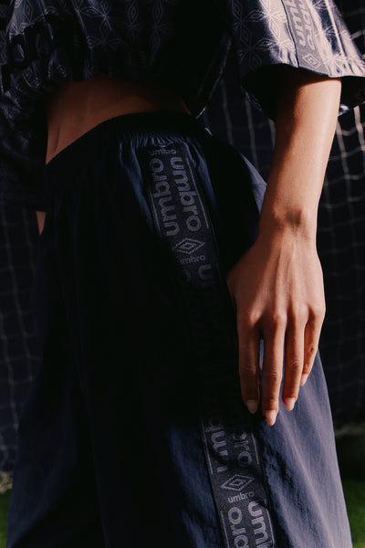 https://cdn.shopify.com/s/files/1/0293/9277/files/05-11-26_UMBRO_-Collection_LOOK_62_RA_CW_10-14-50_11848_ES.jpg?v=1780421321&with=400&height=600