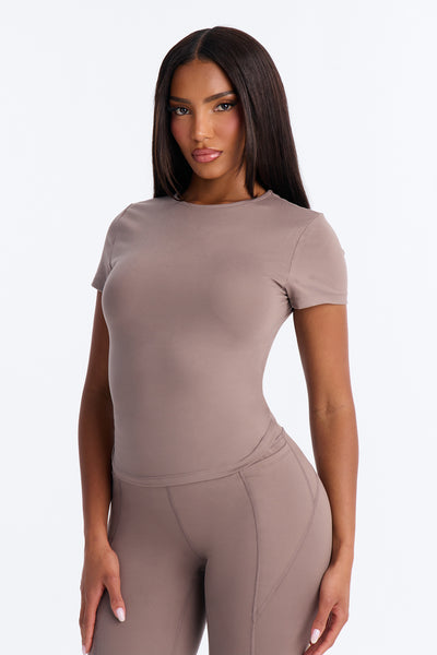 https://cdn.shopify.com/s/files/1/0293/9277/files/06-15-26_S1_36_10453TN_Stone_LB_SS_14-02-05_50458_PXF.jpg?v=1781806800&with=400&height=600
