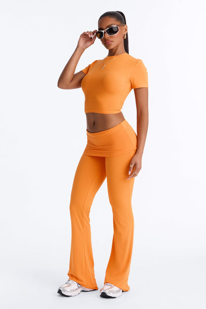 https://cdn.shopify.com/s/files/1/0293/9277/files/06-16-26_S2_58_YPS60068_Orange_KJ_IM_14-02-50_6739_MWA.jpg?v=1781814237