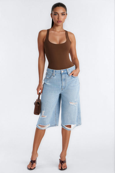 https://cdn.shopify.com/s/files/1/0293/9277/files/07-07-26_S5_46_KJGB5021809_Chocolate_RK_IM_15-25-32_77573-FN_Remi_MidSleek-PXF_CM_MH.jpg?v=1784586275&with=400&height=600