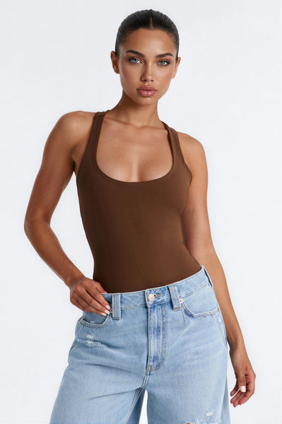 https://cdn.shopify.com/s/files/1/0293/9277/files/07-07-26_S5_46_KJGB5021809_Chocolate_RK_IM_15-25-57_77586-FN_Remi_MidSleek-PXF.jpg?v=1784586275&with=400&height=600