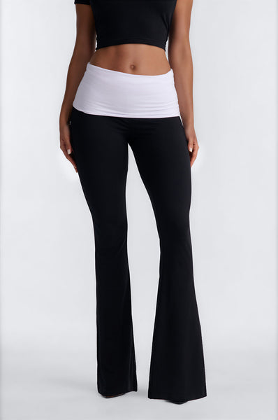 https://cdn.shopify.com/s/files/1/0293/9277/files/07-08-26_S3_35_7PNK3B0046NV_BlackWhite_JG_AA_13-51-29_76011-FN_Remi_MidSleek-PXF_BH.jpg?v=1784744874&with=400&height=600