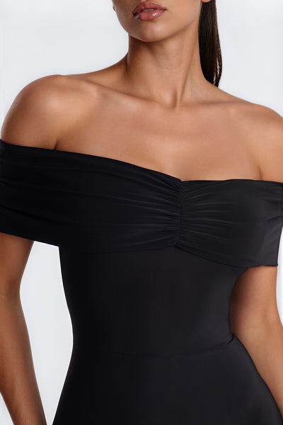 https://cdn.shopify.com/s/files/1/0293/9277/files/07-13-26_S9_27_B126JP0606_Black_KP_AA_13-36-48_2826-FN_Remi_HighSleek.jpg?v=1784736831&with=400&height=600