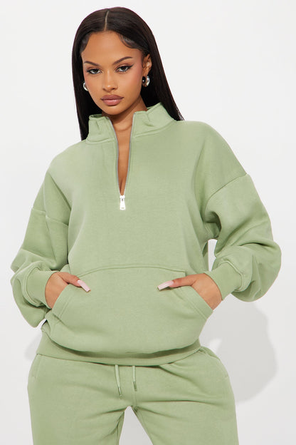 https://cdn.shopify.com/s/files/1/0293/9277/files/07-24-25_S2_49_123QUARTERZIP_Sage_JZ_SS_15-28-29_13697_PXF.jpg?v=1753551463