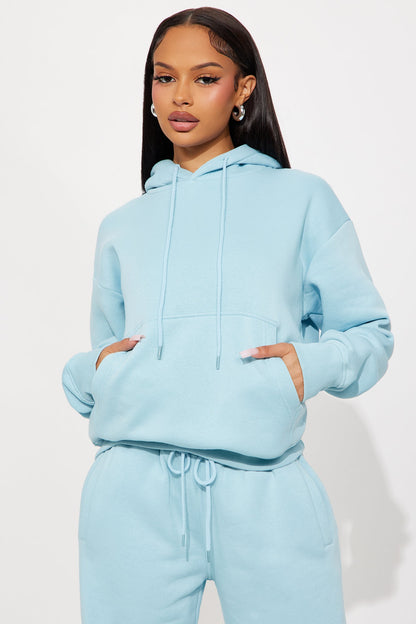 https://cdn.shopify.com/s/files/1/0293/9277/files/07-30-25_S6_44_123HOODIE_LightBlue_HY_RL_15-37-23_96145_PXF.jpg?v=1754064301