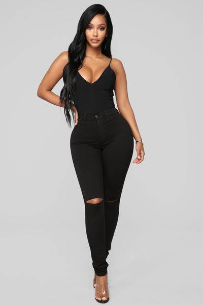 https://cdn.shopify.com/s/files/1/0293/9277/products/10-29-18_Studio_2_11-30-53_BLACK_JEAN_TEMP0423_DM.jpg?v=1690323130&with=400&height=600