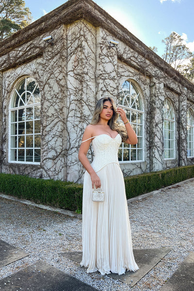 https://cdn.shopify.com/s/files/1/0293/9277/files/11-03-25_Daniella_Lace_Corset_Pleated_Maxi_Dress_Cream_093_JR.jpg?v=1772044734&with=400&height=600