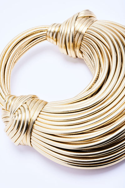 https://cdn.shopify.com/s/files/1/0293/9277/files/11-16-23Studio10_CXB_07-28-51_10_BAGAPRIL2206_Gold_0185_ES_JF.jpg?v=1717806472&with=400&height=600