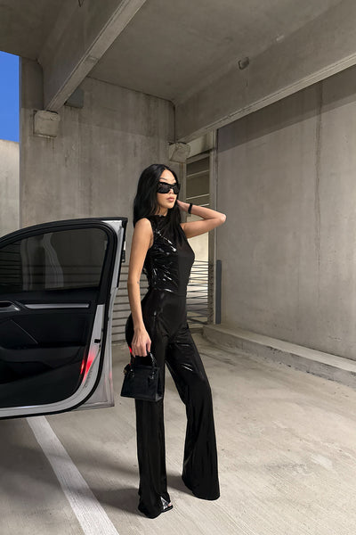 https://cdn.shopify.com/s/files/1/0293/9277/files/12-18-2024__010_This_Is_Me_Metallic_Jumpsuit_Black_JR.jpg?v=1740185835&with=400&height=600