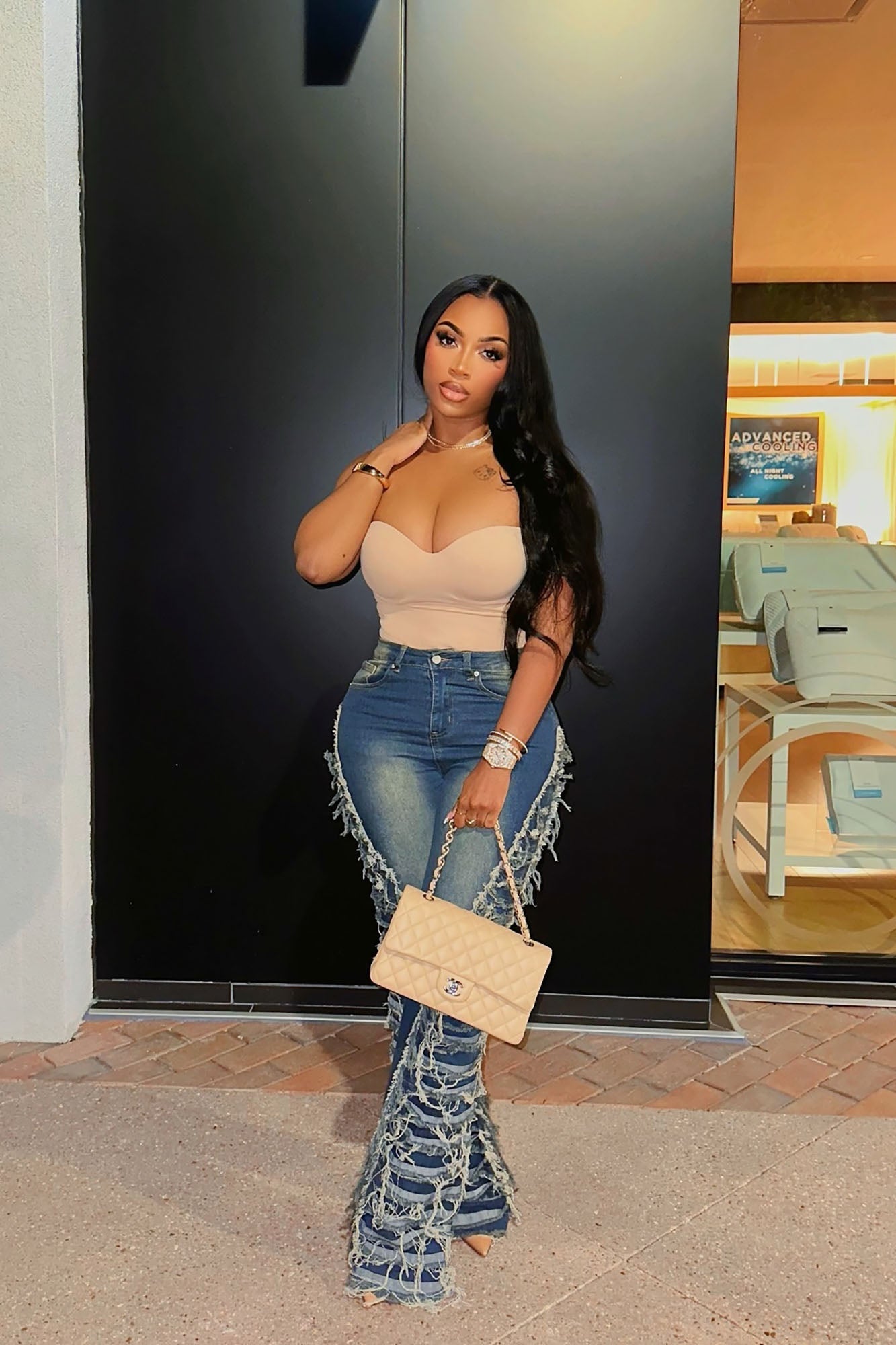 https://cdn.shopify.com/s/files/1/0293/9277/files/3-18-24__029_Feeling_Brand_New_Tinted_Flare_Jeans_Medium_Wash_LA.jpg?v=1747073996