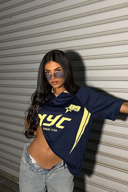 https://cdn.shopify.com/s/files/1/0293/9277/files/5-05-25__444_Pro_League_Graphic_Jersey_Navy_JR.jpg?v=1749918642