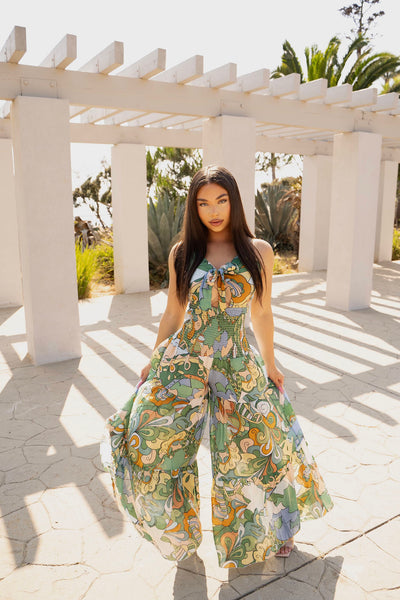 https://cdn.shopify.com/s/files/1/0293/9277/files/6-11-2024__144__Kamiyah_printed_jumpsuit_GF.jpg?v=1722558006&with=400&height=600