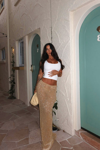 https://cdn.shopify.com/s/files/1/0293/9277/files/6-16-25__465_Lost_In_Paradise_Sequin_Maxi_Skirt_Gold_2__JR.jpg?v=1753899600