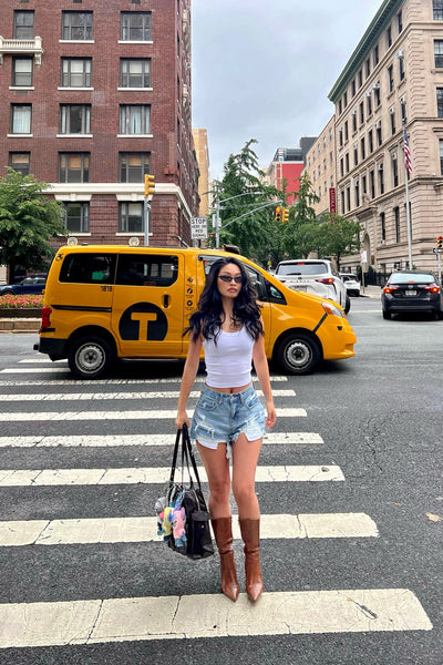 https://cdn.shopify.com/s/files/1/0293/9277/files/6-23-25__463_Remi_Tank_Top_White_JR_66606172-be12-479f-9fb8-dcdf1d66f03e.jpg?v=1773943831&with=400&height=600