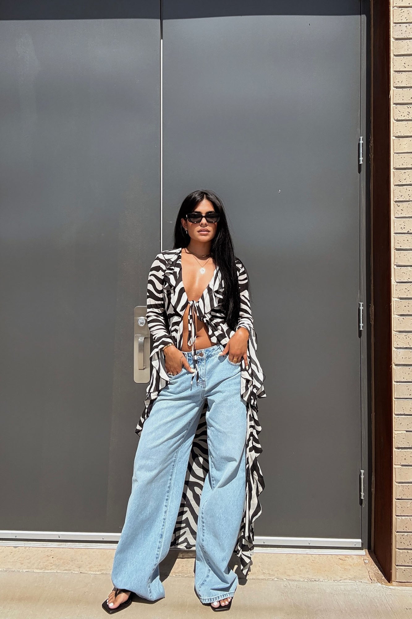 https://cdn.shopify.com/s/files/1/0293/9277/files/7-07-25_Wild_Seduction_Zebra_Chiffon_Maxi_Top_Black-combo_073_JR.jpg?v=1755300539