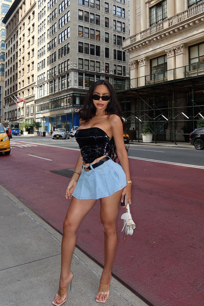 https://cdn.shopify.com/s/files/1/0293/9277/files/7-8-2024__083_Claire_Micro_Mini_Pleated_Skort_Light_Wash_LA.jpg?v=1721754292&with=400&height=600