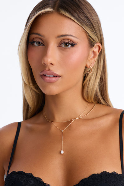 https://cdn.shopify.com/s/files/1/0293/9277/files/BINA548GCM_Gold_JR_V1.jpg?v=1791561070&with=400&height=600