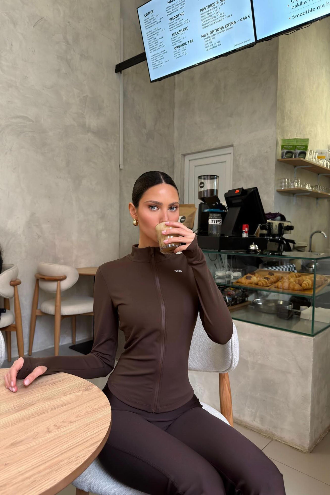 https://cdn.shopify.com/s/files/1/0293/9277/files/CloudForm_LongSleeveFullZipJacket-Brown_JR.jpg?v=1775147486