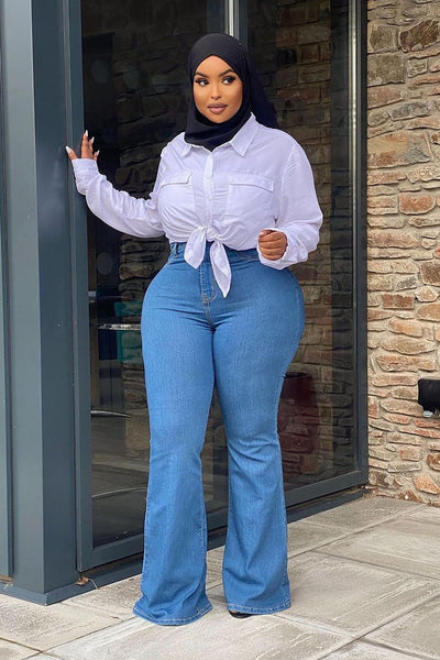 https://cdn.shopify.com/s/files/1/0293/9277/products/DeepInMySoulFlareJeans-MediumBlueWash_4__MER_PLUS.jpg?v=1674859860&with=400&height=600