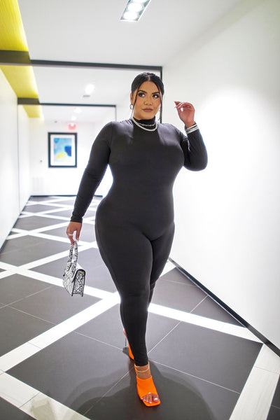 https://cdn.shopify.com/s/files/1/0293/9277/products/FriskyFelineJumpsuit-Black_MER_CURVE.jpg?v=1629398663&with=400&height=600