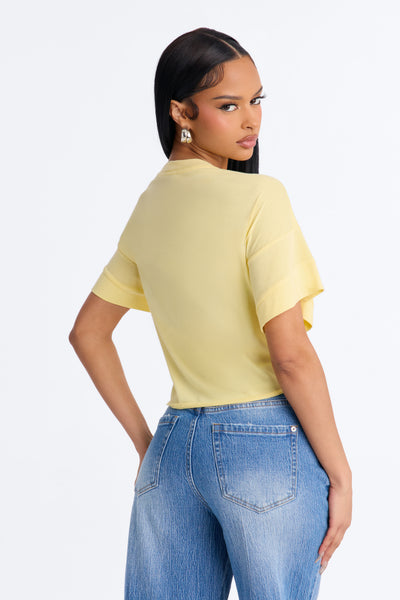 https://cdn.shopify.com/s/files/1/0293/9277/files/JT46535_ButterYellow_JR_V4.jpg?v=1783351879&with=400&height=600