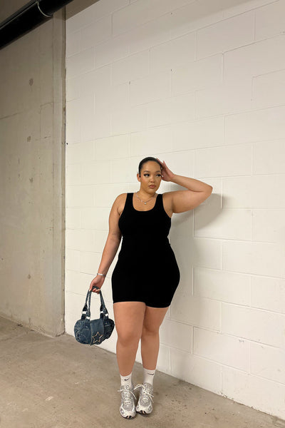 https://cdn.shopify.com/s/files/1/0293/9277/files/NaveahScoopNeckSnatchedRomper-Black_GF.jpg?v=1717607772&with=400&height=600
