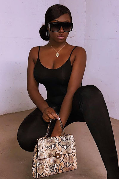 https://cdn.shopify.com/s/files/1/0293/9277/products/NovaSeasonJumpsuit-Black_3__MER.jpg?v=1776291218&with=400&height=600