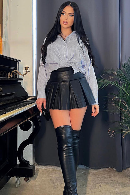 https://cdn.shopify.com/s/files/1/0293/9277/products/PlayfulDistractionPleatedMiniSkirt-Black_MER.jpg?v=1648747822