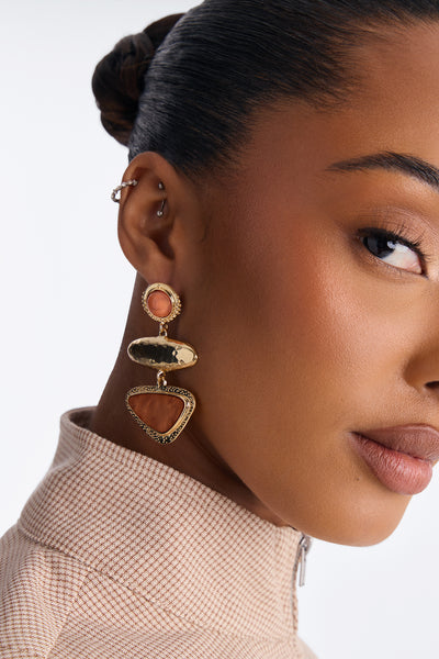 https://cdn.shopify.com/s/files/1/0293/9277/files/TROY10816_Gold_Brown_JR_V2.jpg?v=1784669460&with=400&height=600