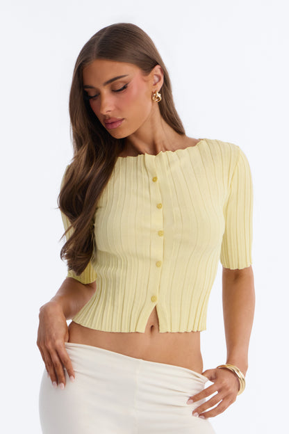https://cdn.shopify.com/s/files/1/0293/9277/files/V426KT0501_ButterYellow_JR_V1.jpg?v=1780413256