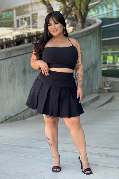 https://cdn.shopify.com/s/files/1/0293/9277/products/WhenGoodMeetsBadPleatedMiniSkort-Black_MER_CURVE.jpg?v=1631293588&with=400&height=600