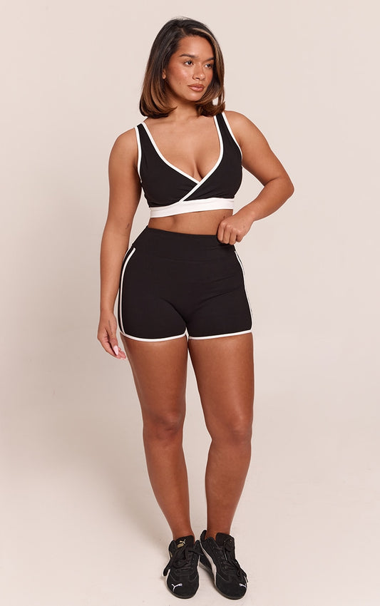 https://cdn-img.prettylittlething.com/c/f/b/4/cfb414172d731553d7a931ac8b390f36112f82b0_CNP4444_1_shape_black_sculpt_contrast_stripe_detail_shorts.jpg
