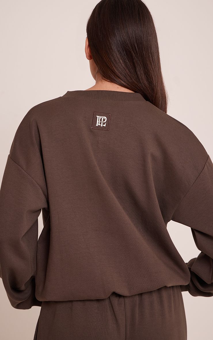 https://mediahub.prettylittlething.com/cnp0447_chocolate_xl_3